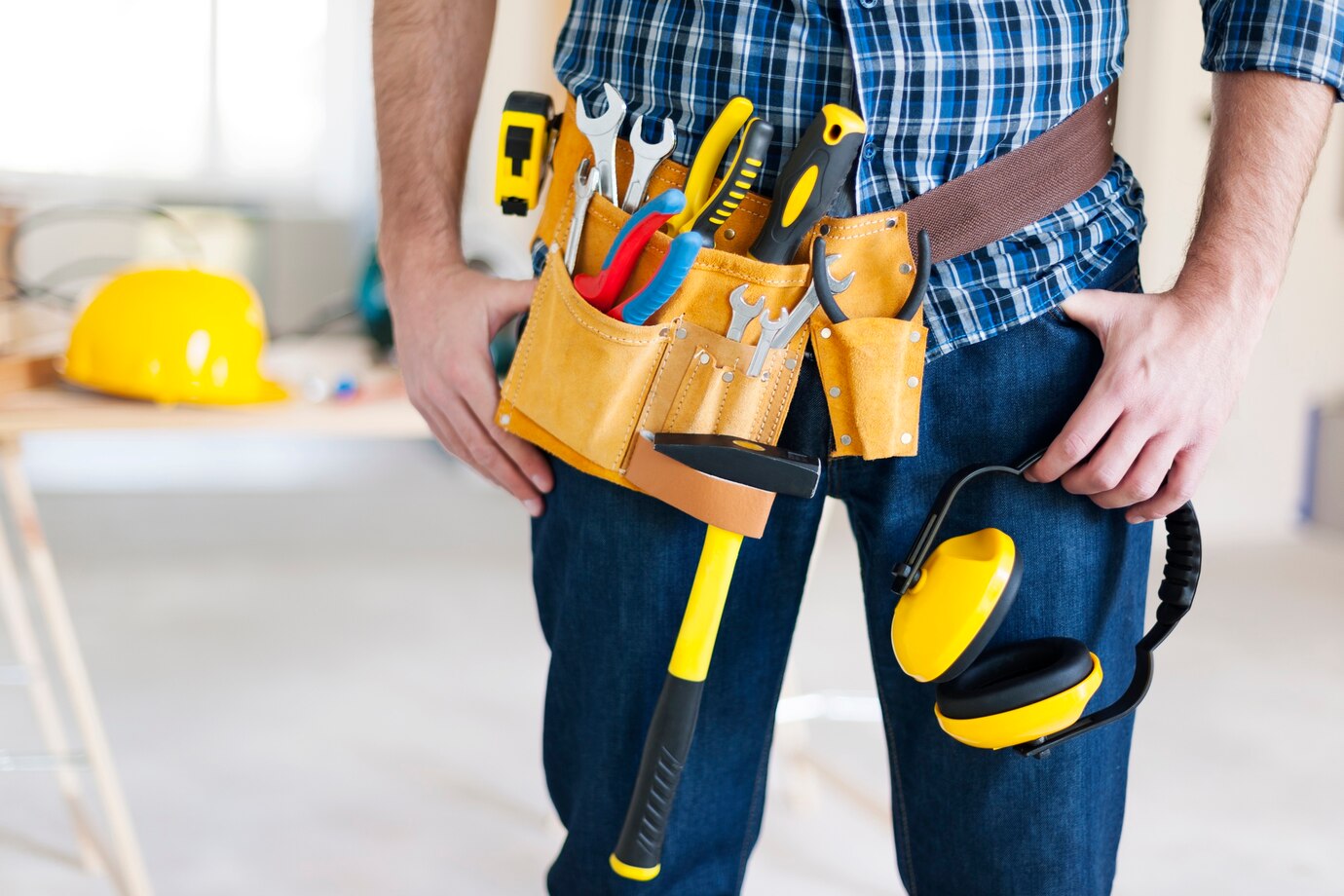 part-construction-worker-with-tools-belt_329181-3769